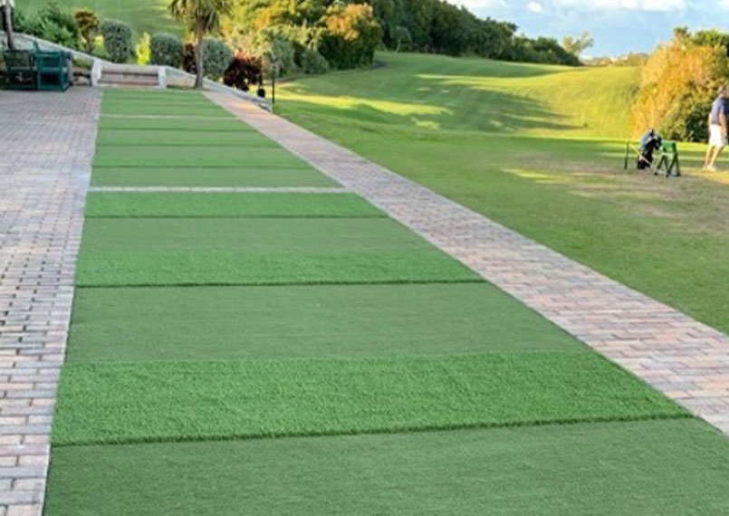 image of SYNLawn turf being used at a driving range