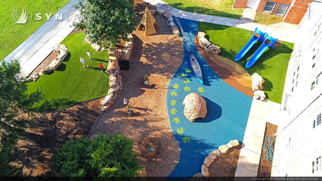 image of Child safe SYNLawn artificial playground grass and poured in place rubber surfacing at Reed Elementary Ladue, Missouri
