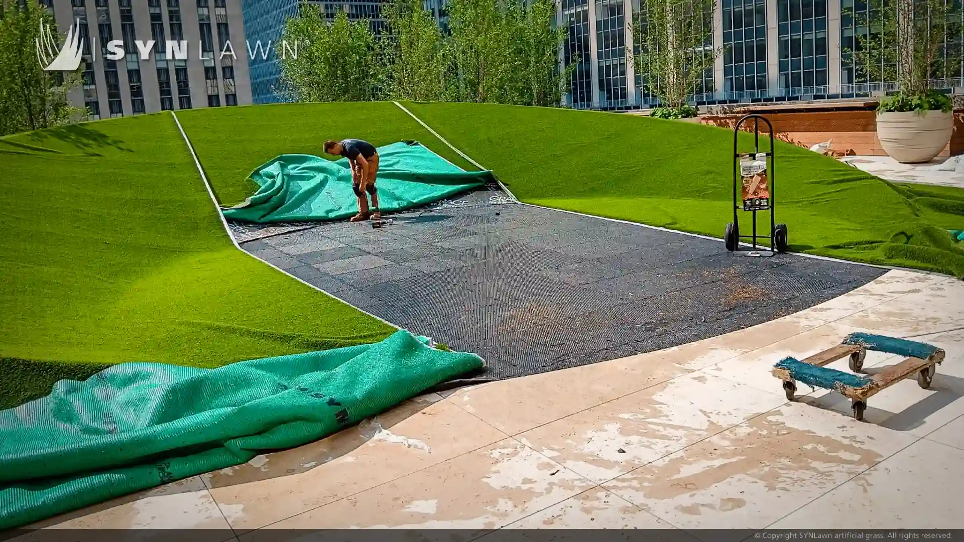 SYNLawn artificial grass at 50 Rockefeller Center Rooftop Art Deco Design image of art deco design using synthetic turf at 50 Rockefeller Center New York City