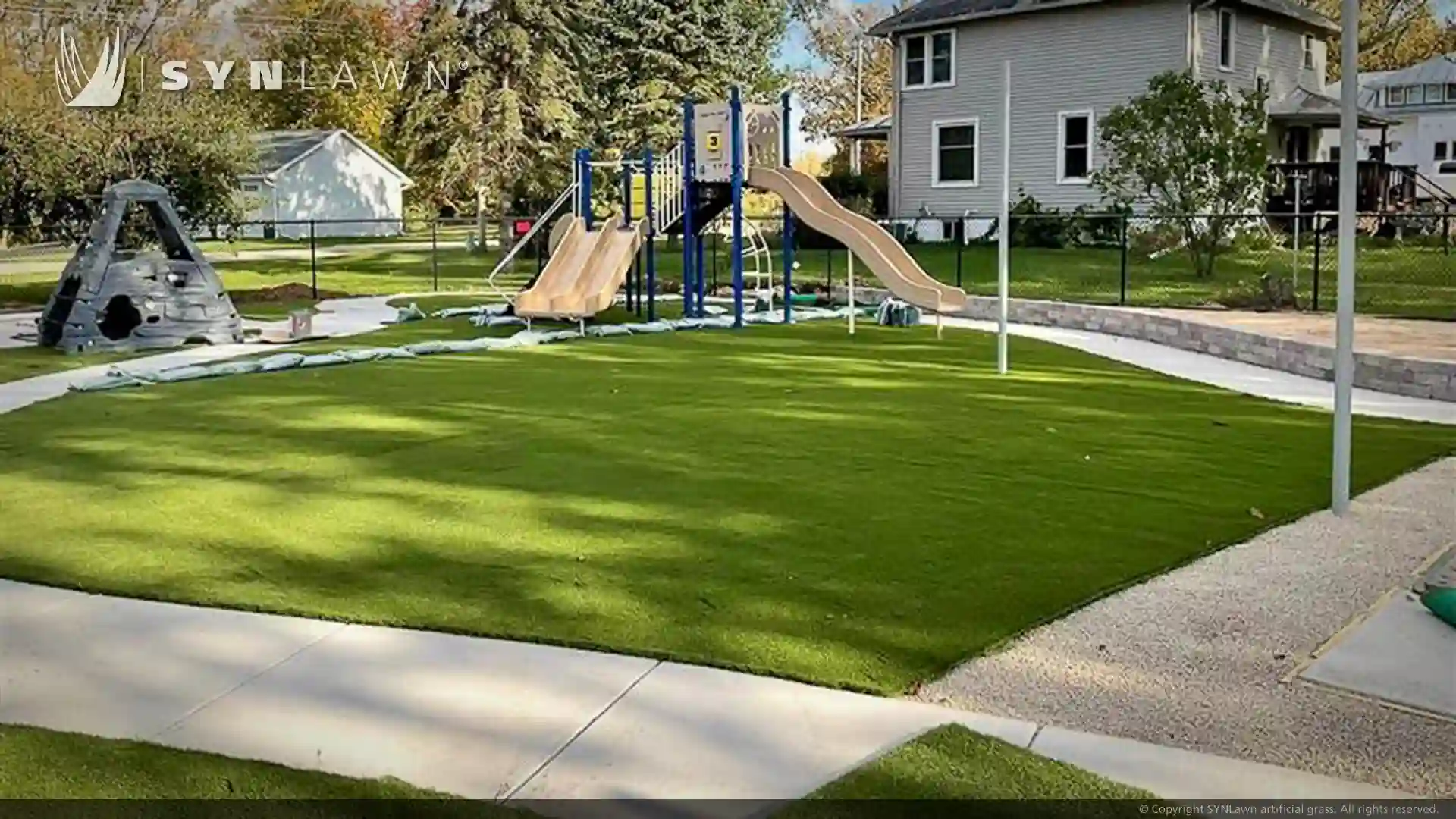 SYNLawn artificial grass at Saint Paul Child Care Center Wisconsin Day Care Playground image of SYNLawn artificial grass at Saint Paul child care center Wisconsin day care playground
