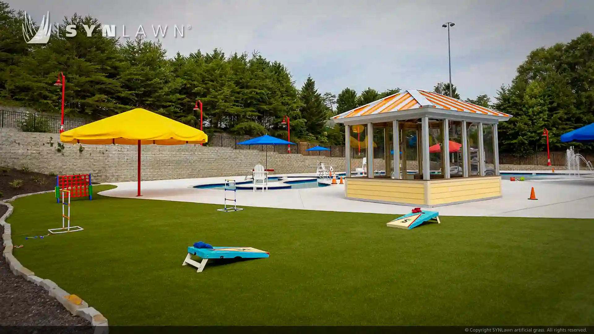 SYNLawn SYNSport artificial grass at Victory Junction Camp and Water Park Randleman North Carolina image of children and teenagers playing on artificial grass at victory junction camp water park North Carolina