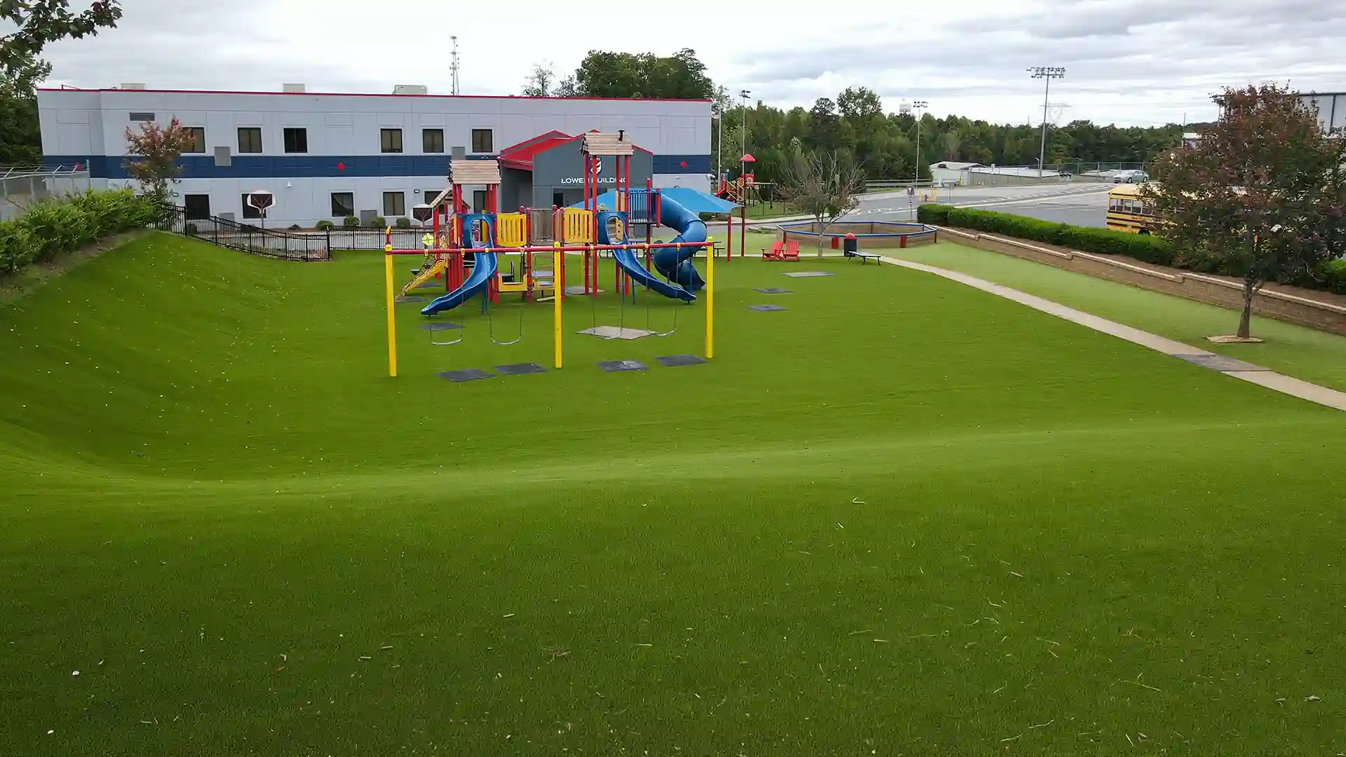 SYNLawn artificial grass for play areas at Lincoln Charter School Playground Denver North Carolina image of SYNLawn artificial grass for play areas at Lincoln Charter School Playground Denver North Carolina