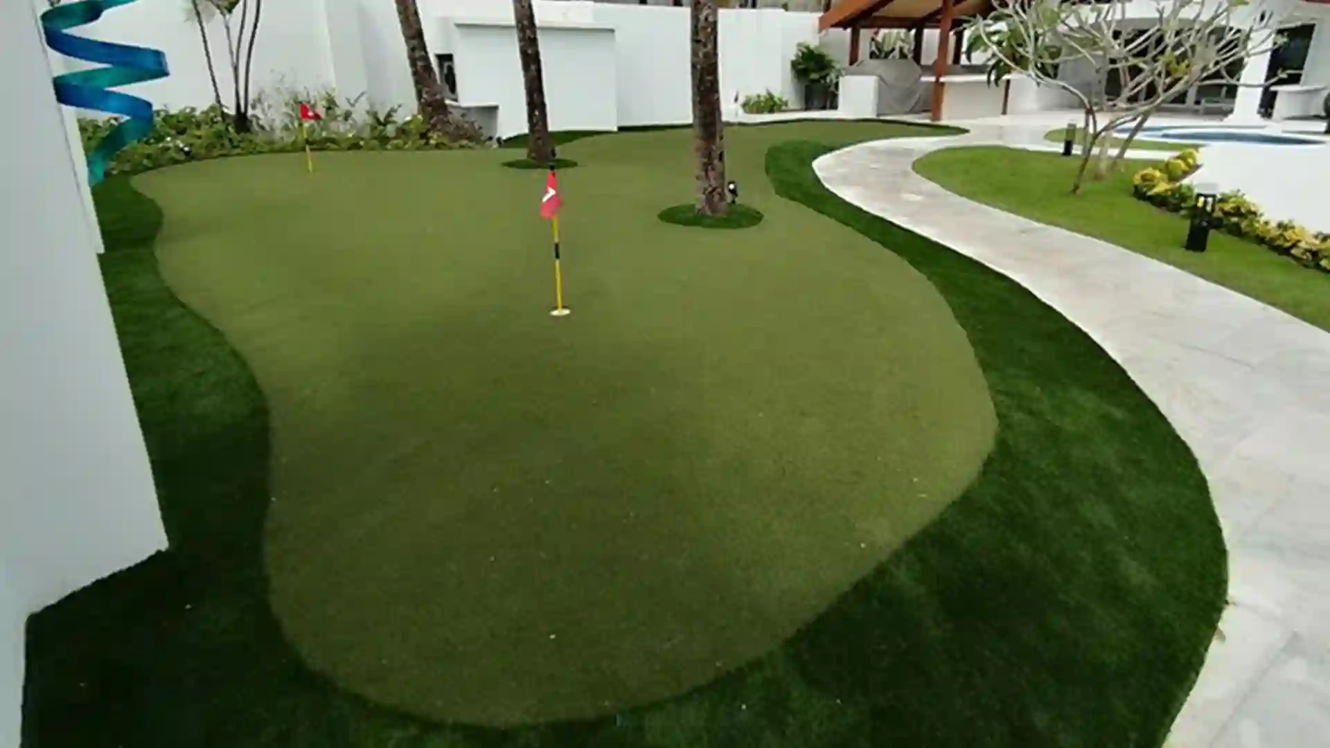 SYNLawn artificial grass private oceanside custom putting green in Jaco Costa Rica image of syn lawn artificial grass oceanside putting green in Jaco Costa Rica