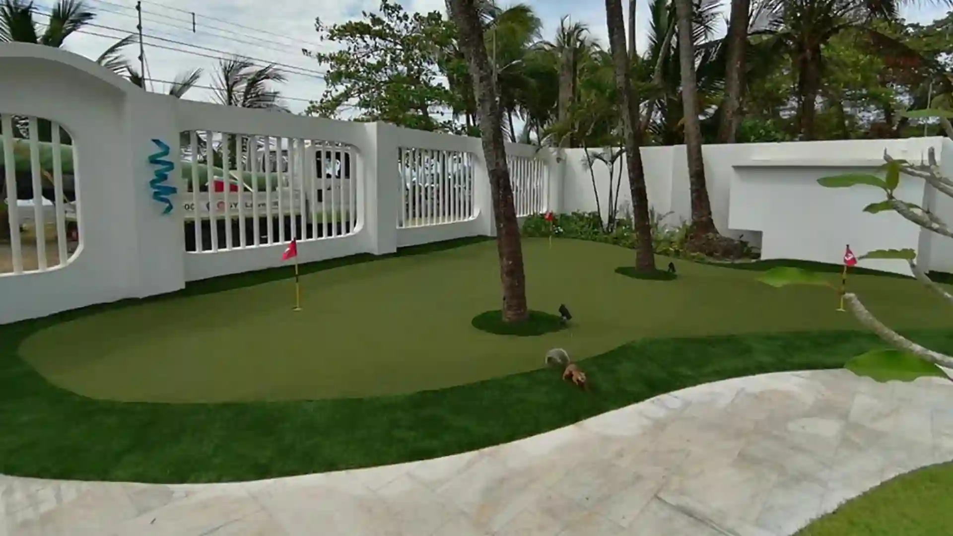 SYNLawn artificial grass private oceanside custom putting green in Jaco Costa Rica image of syn lawn artificial grass oceanside putting green in Jaco Costa Rica